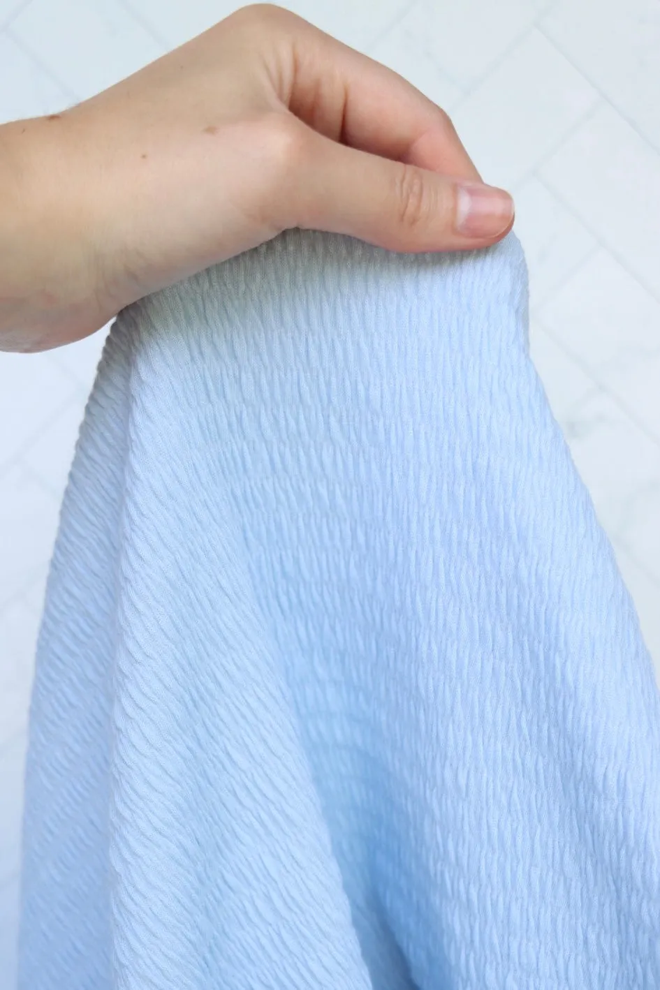 Pastel Blue Smocked Jersey Knit