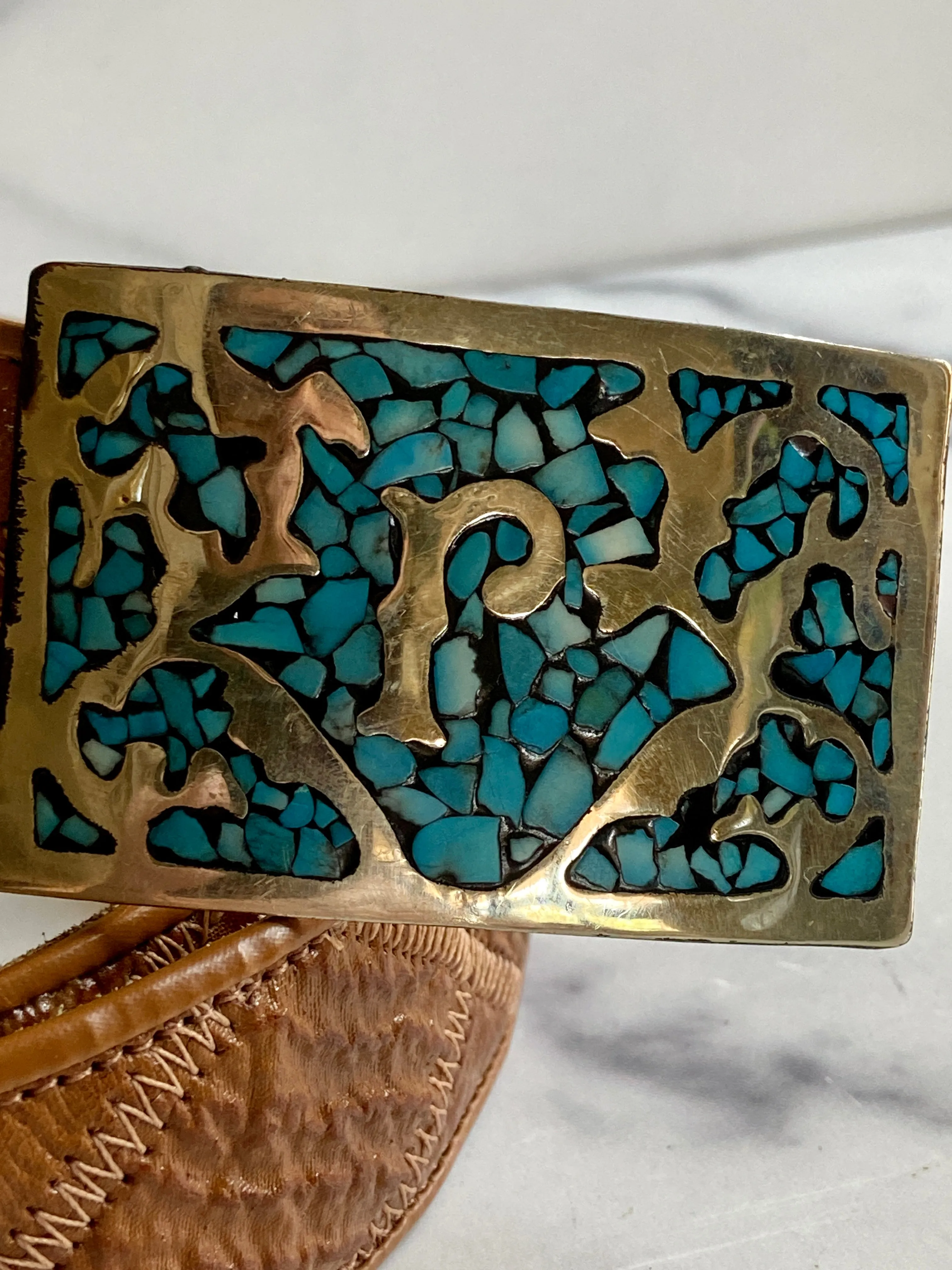 Turquoise Belt Buckle in a vintage leather tooled belt